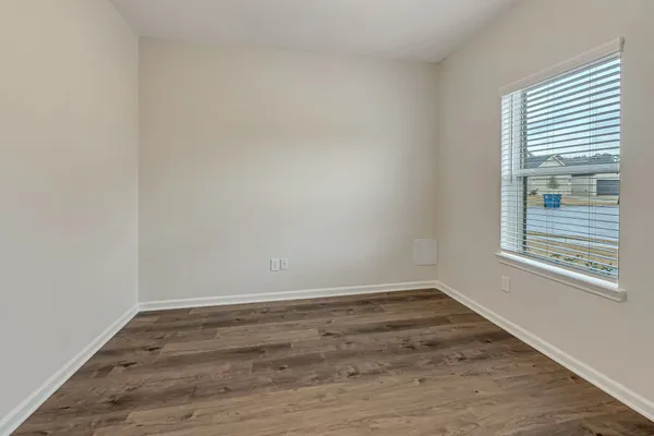 a view of a room that has a window in it