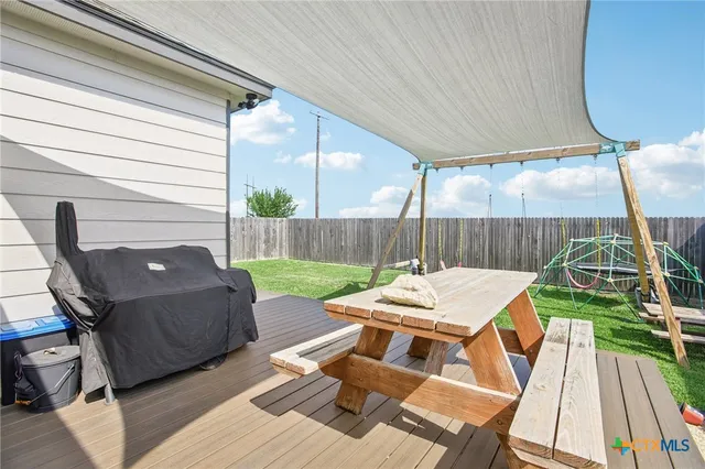 a view of a backyard with a slide