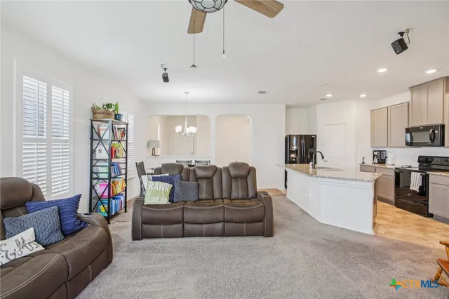 a view of a hallway with windows