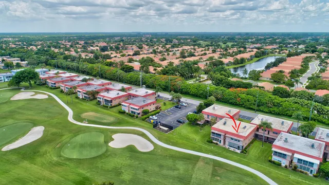 an aerial view of a play ground with lots of swings and slides