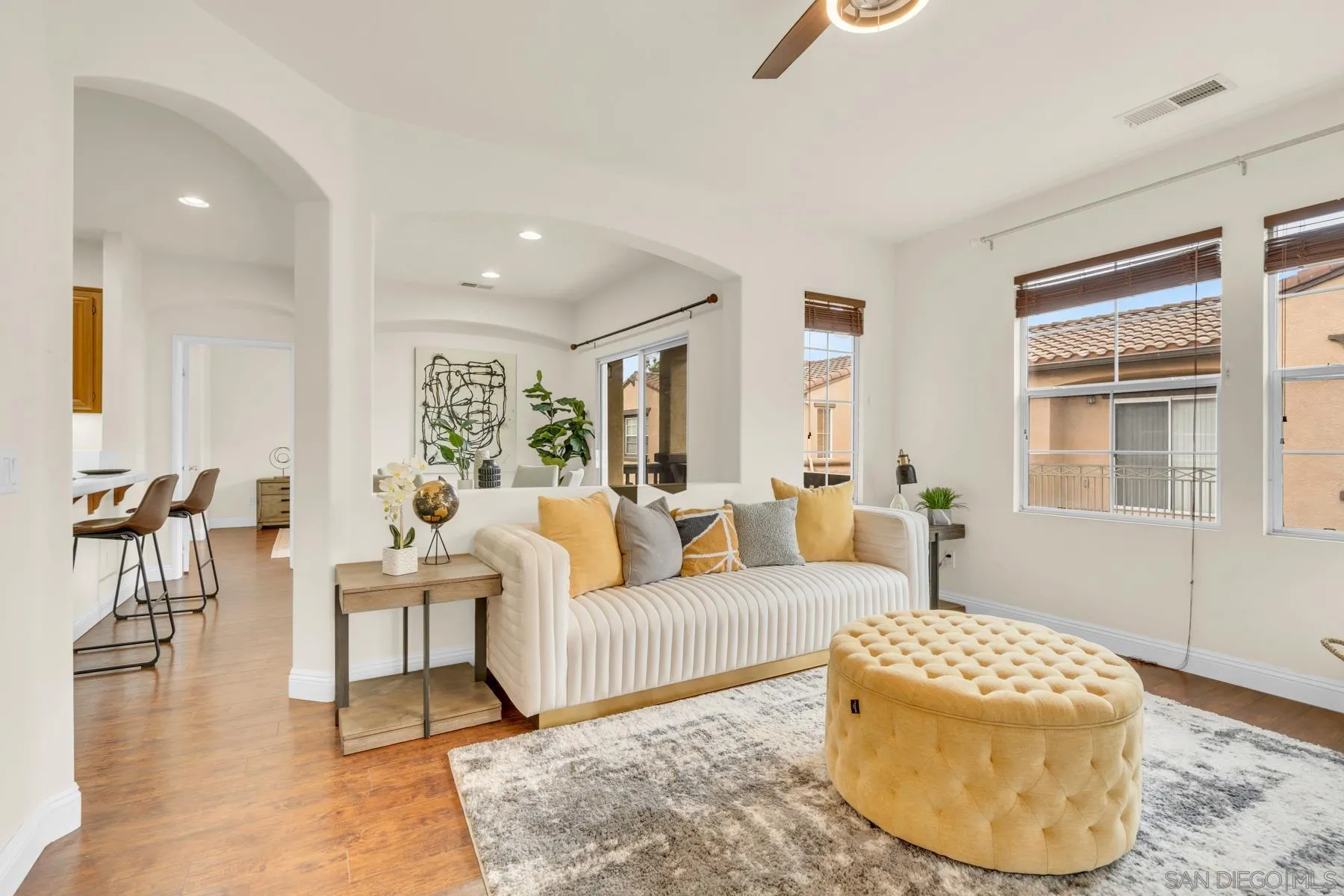 649 Sumner Way, Unit 6 Oceanside, CA 92058 - Photo 1 of 30 a living room with furniture and a couch