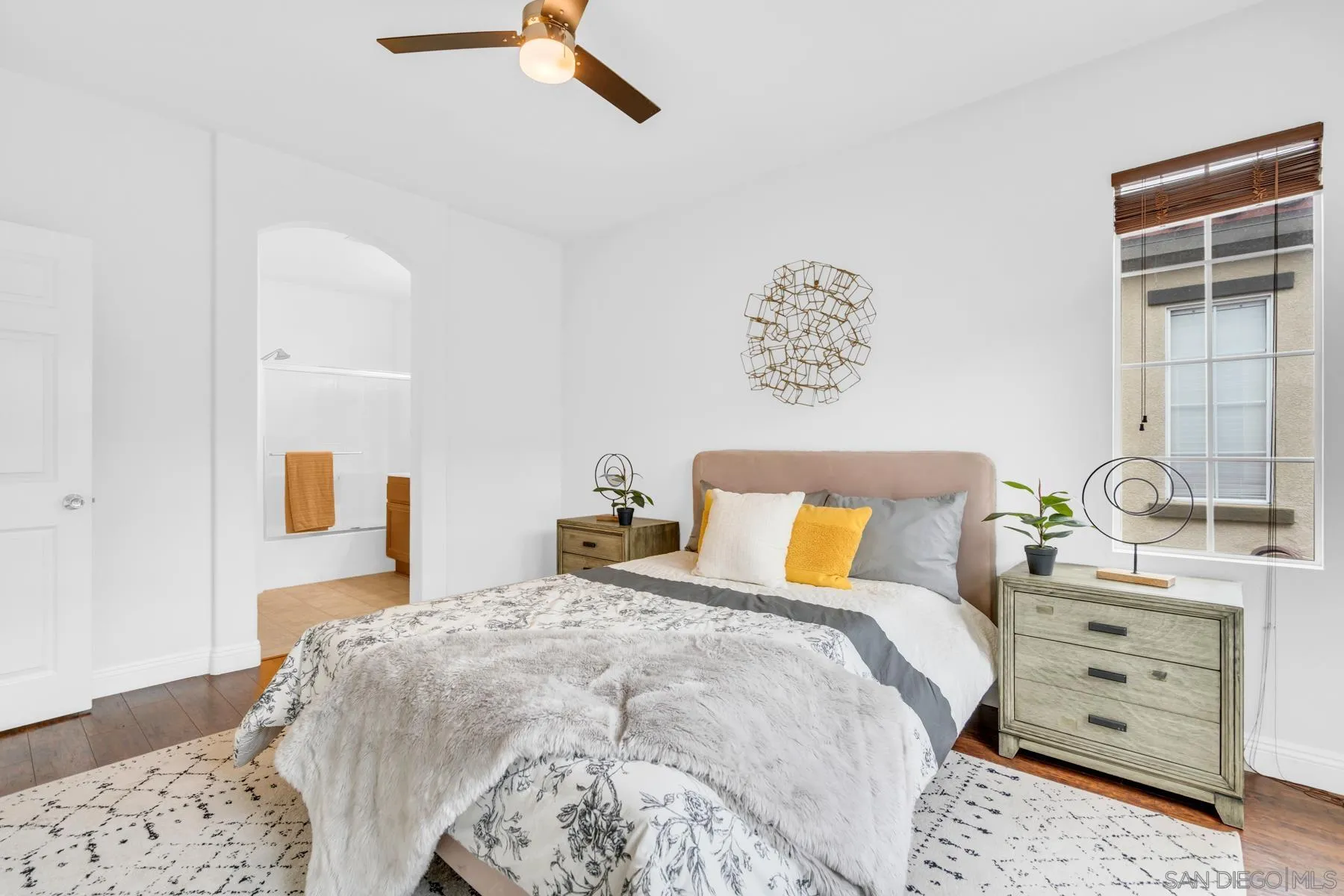 649 Sumner Way, Unit 6 Oceanside, CA 92058 - Photo 11 of 30 a bedroom with a bed and a window