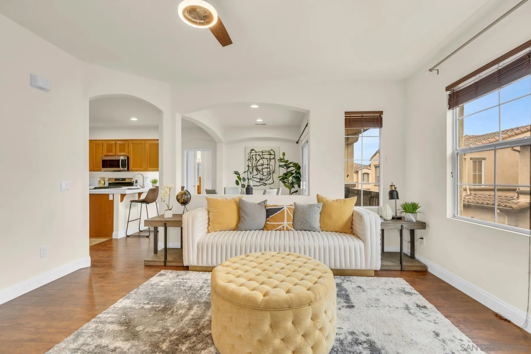 649 Sumner Way, Unit 6 Oceanside, CA 92058 - Photo 2 of 30 a living room with furniture and a large window
