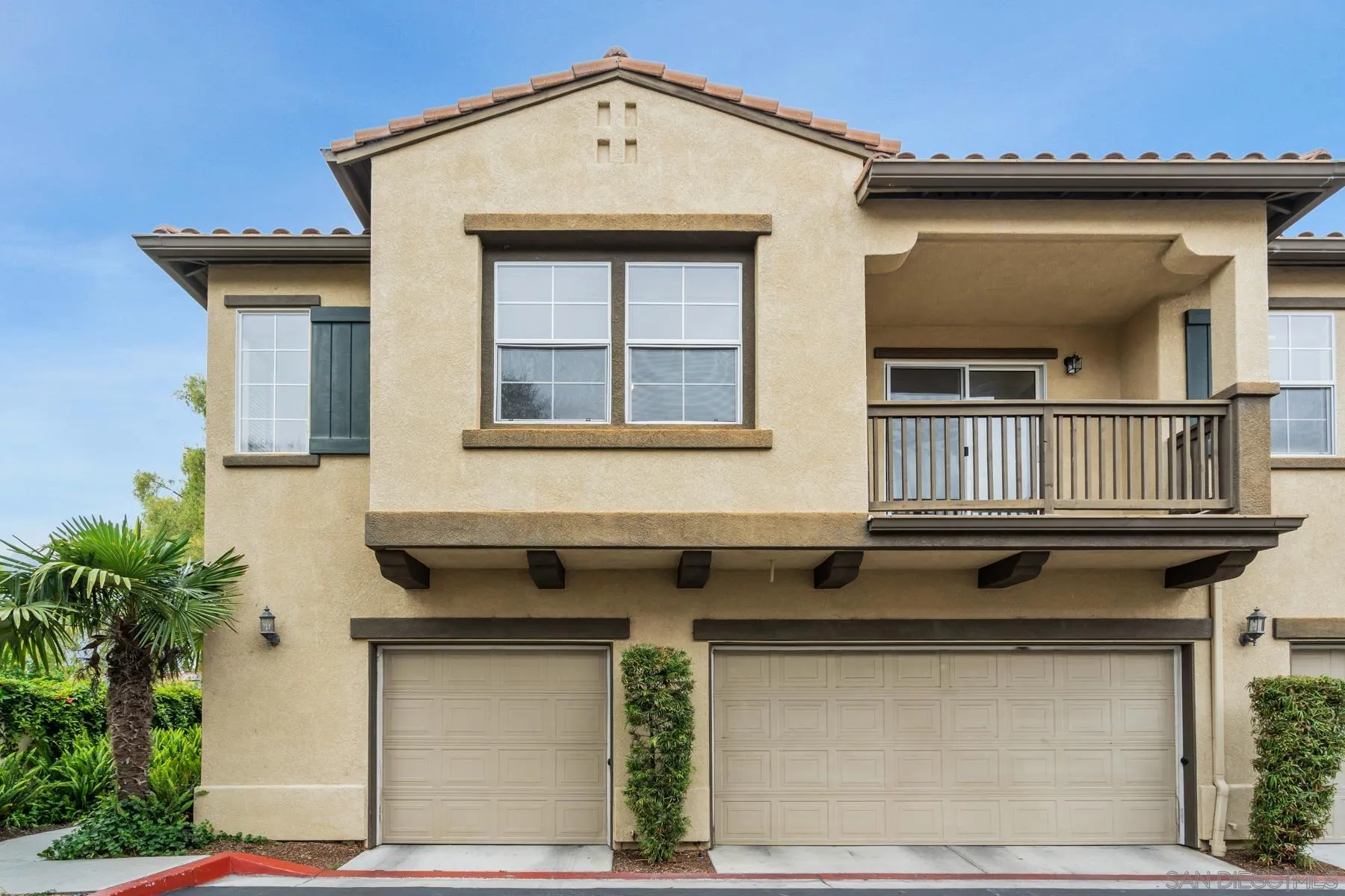 649 Sumner Way, Unit 6 Oceanside, CA 92058 - Photo 23 of 30 a front view of a house with entryway