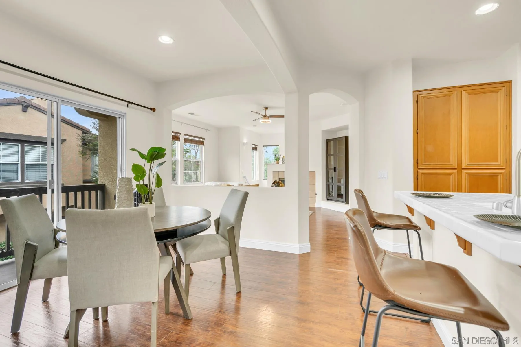 649 Sumner Way, Unit 6 Oceanside, CA 92058 - Photo 5 of 30 a view of a dining room with furniture window and wooden floor