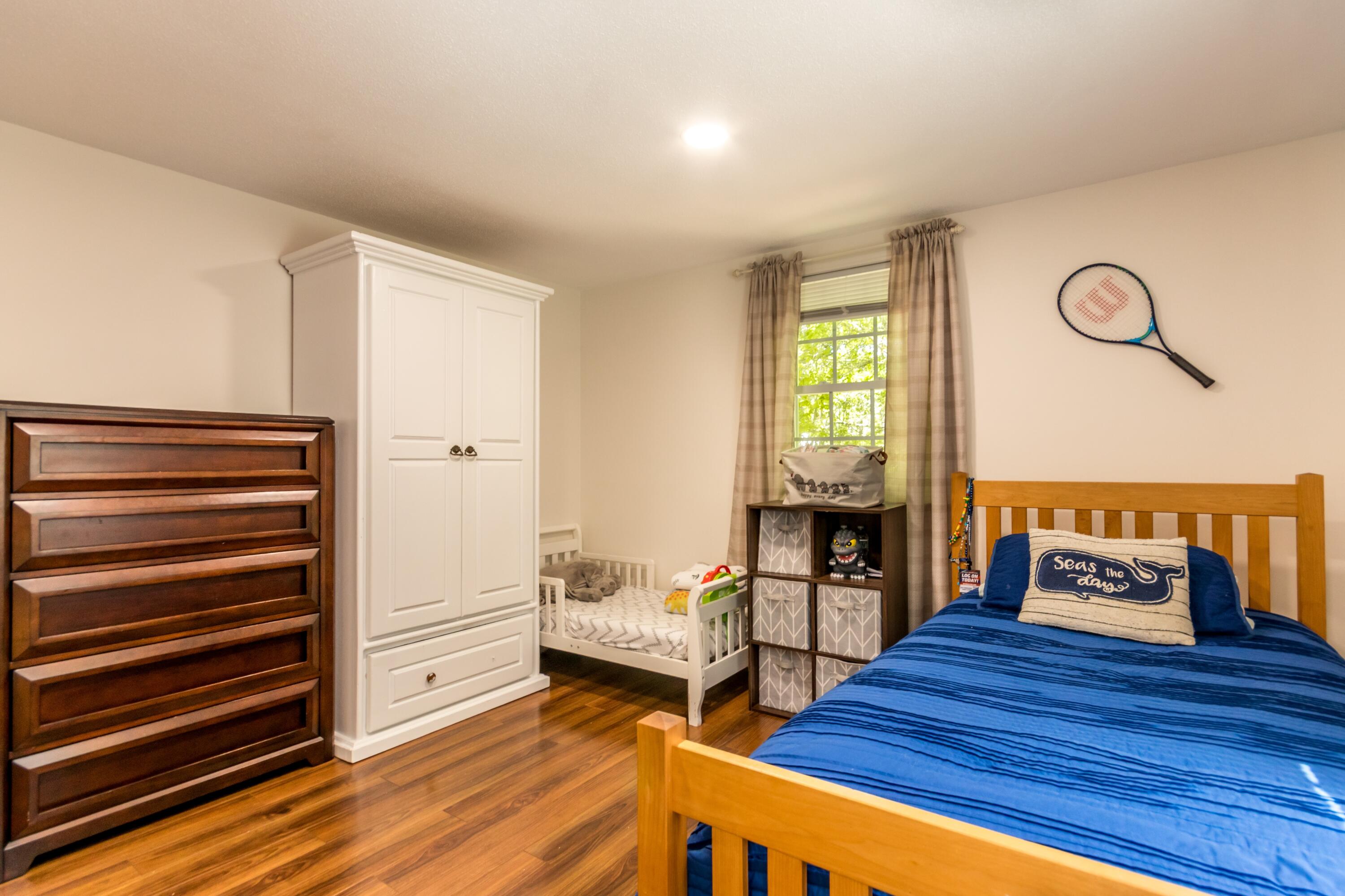 490 Forest Road South Yarmouth, MA 02664 - Photo 22 of 30 Bedroom 2 with laminate floors