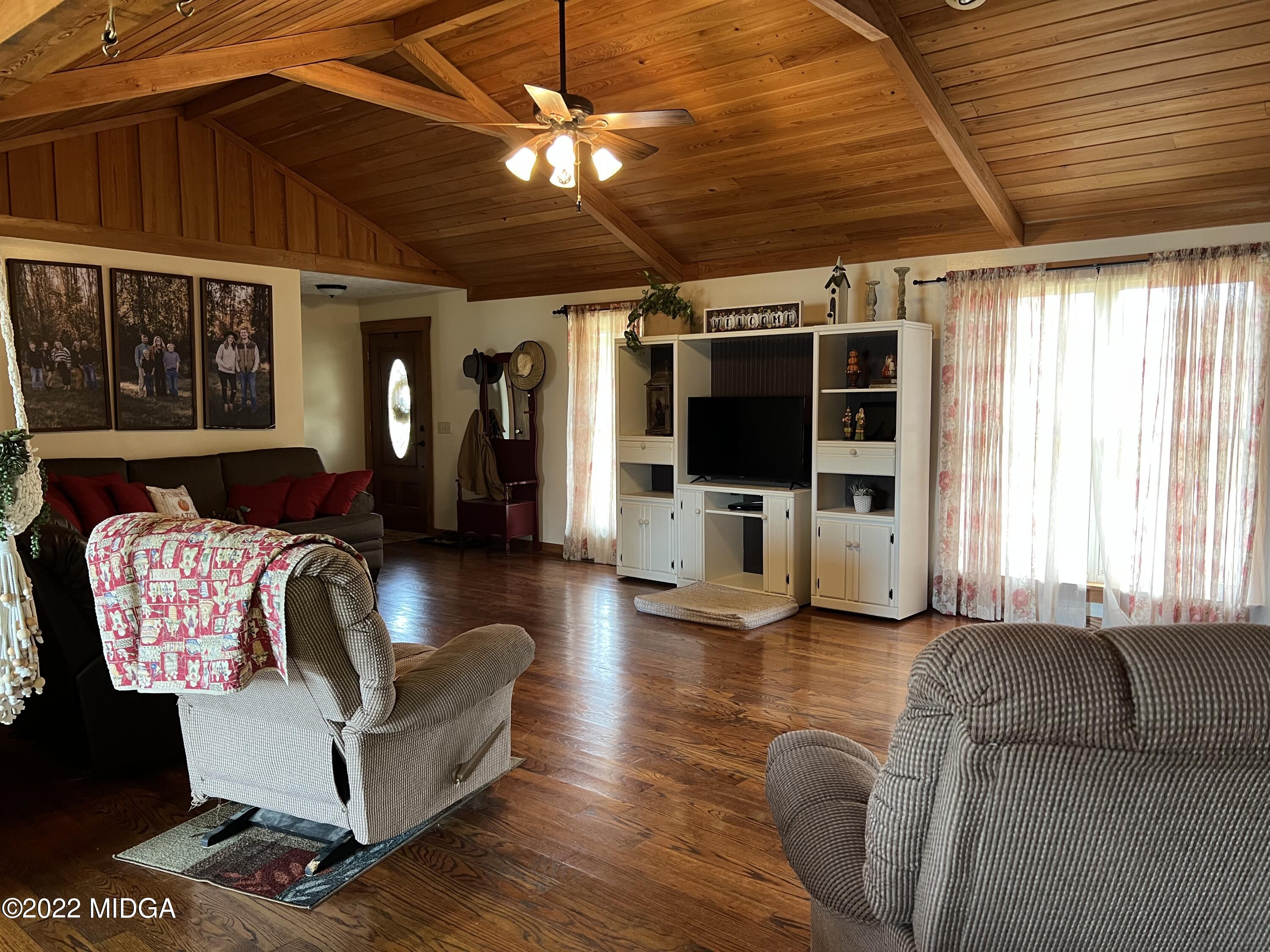 436 Barrow Road Reynolds, GA 31076 - Photo 46 of 91 a living room with furniture and flat screen tv