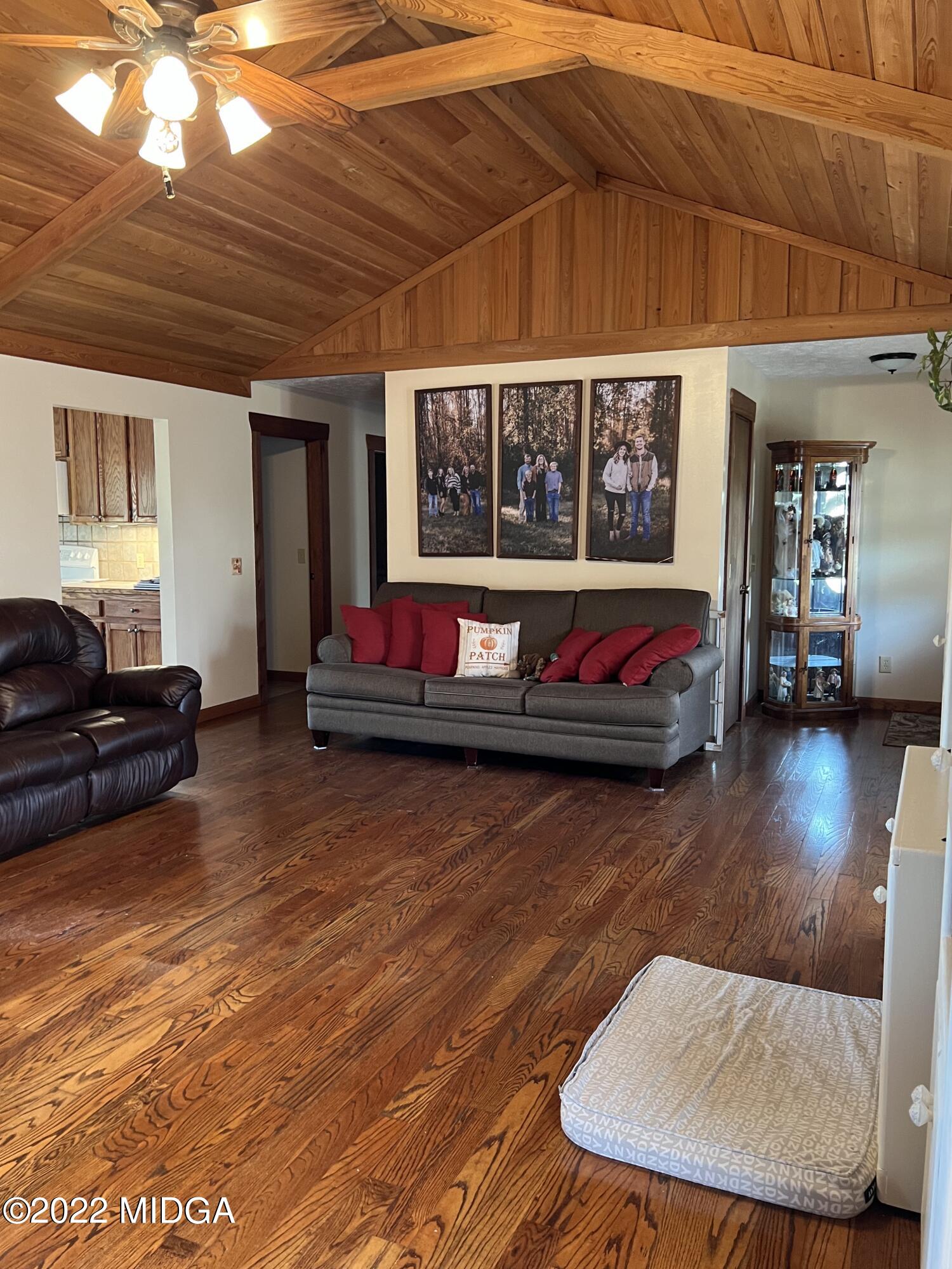 436 Barrow Road Reynolds, GA 31076 - Photo 50 of 91 a living room with furniture pool table and a large window