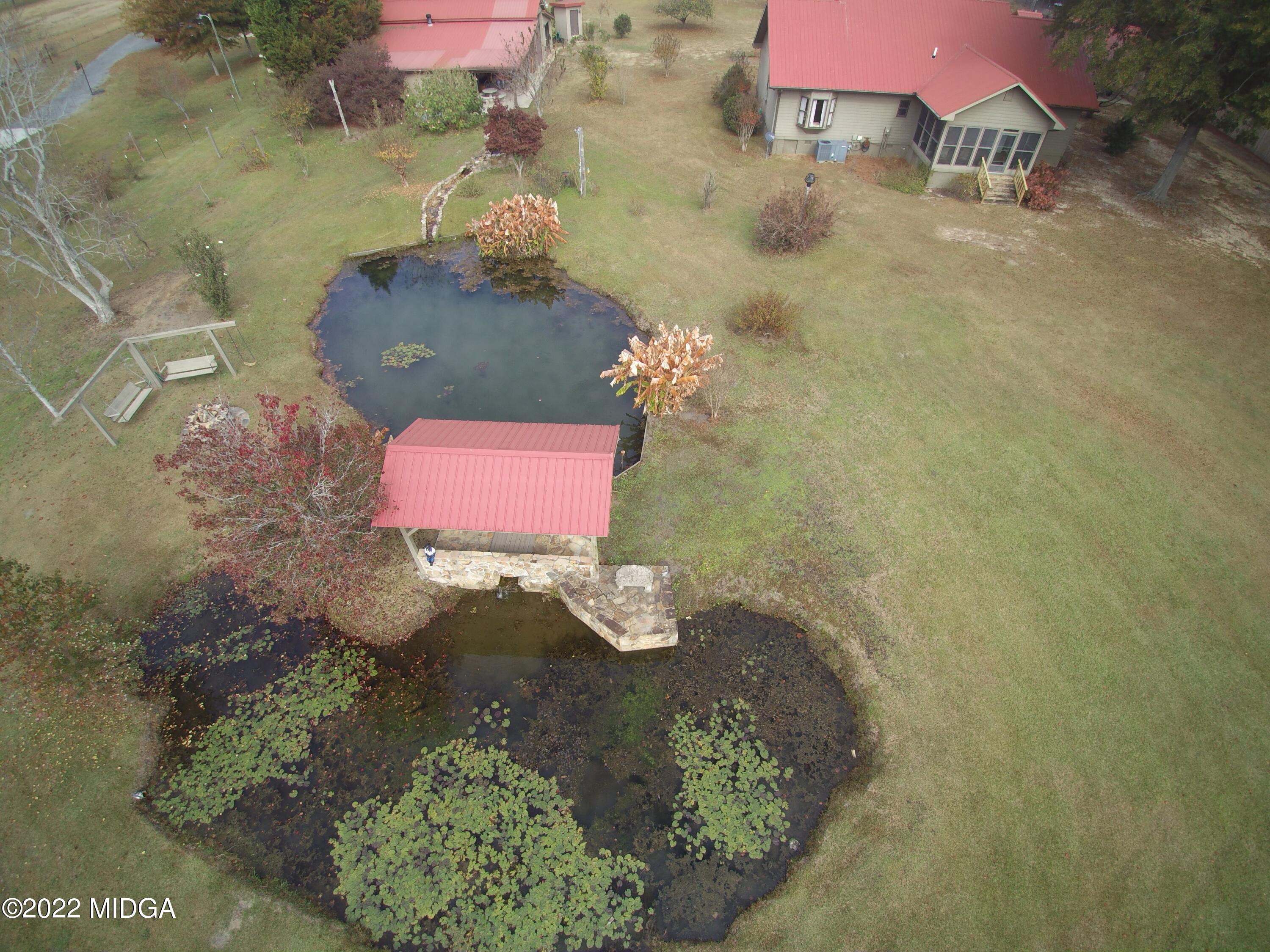 436 Barrow Road Reynolds, GA 31076 - Photo 82 of 91 an aerial view of residential house with outdoor space