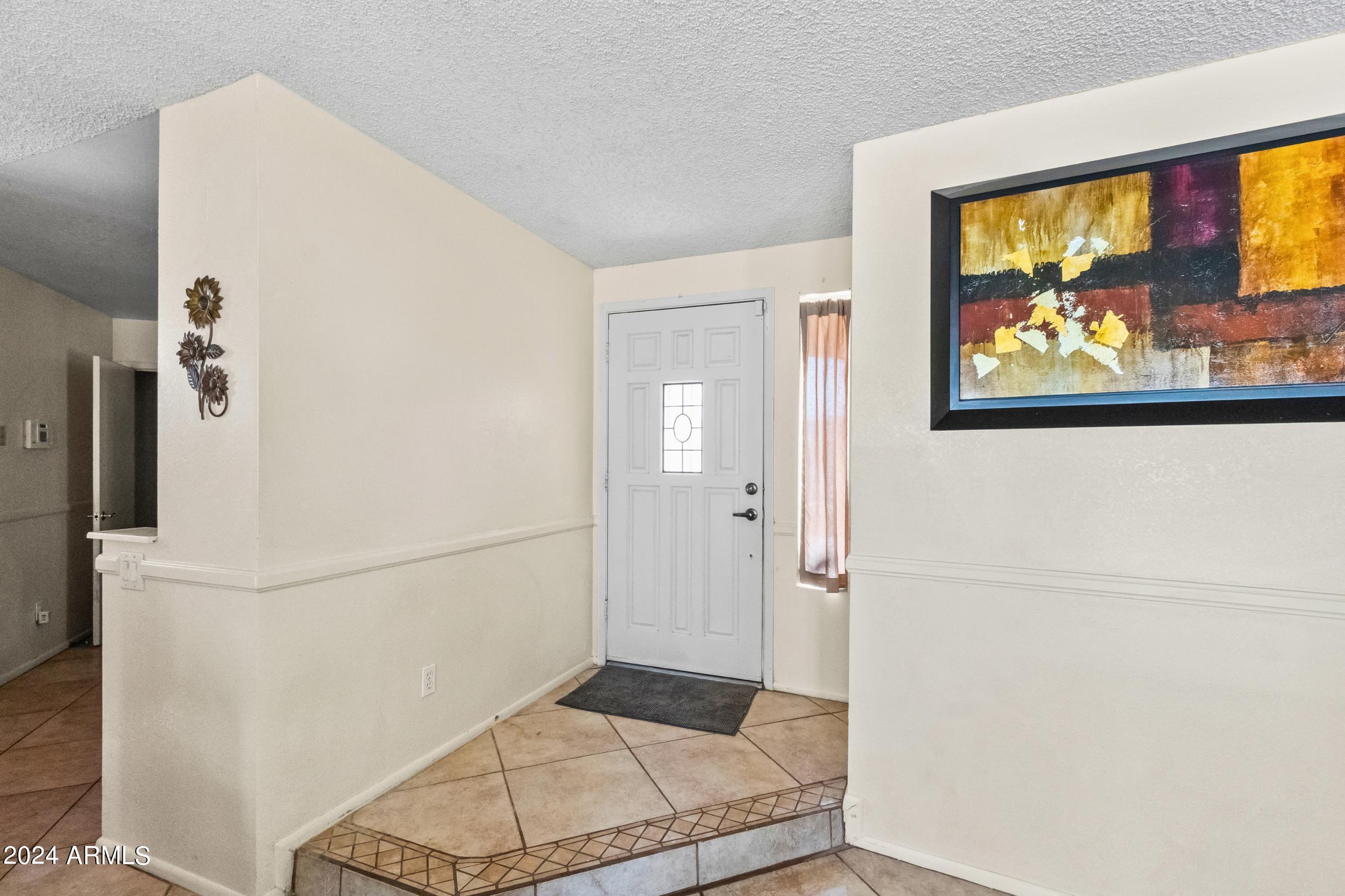 4426 East Vineyard Road Phoenix, AZ 85042 - Photo 3 of 22 6_20.png