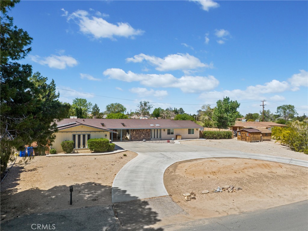 19977 Chickasaw Road Apple Valley, CA 92307 - Photo 1 of 1 a view of a swimming pool with a terrace