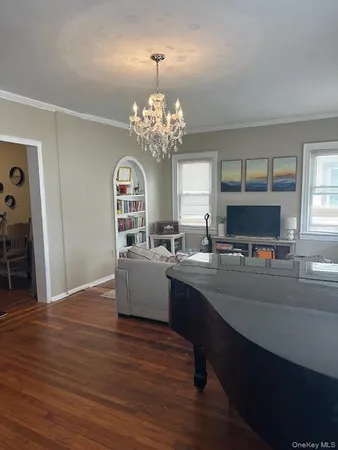 a living room with furniture dining table and a fireplace