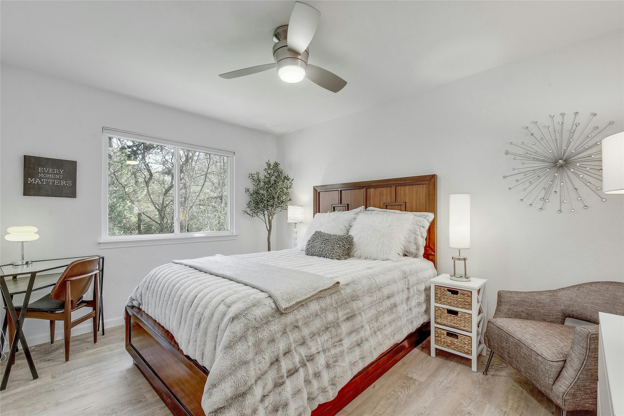 1503 Terrapin Court, Unit B Austin, TX 78746 - Photo 21 of 35 Bedroom with light wood-type flooring and a ceiling fan