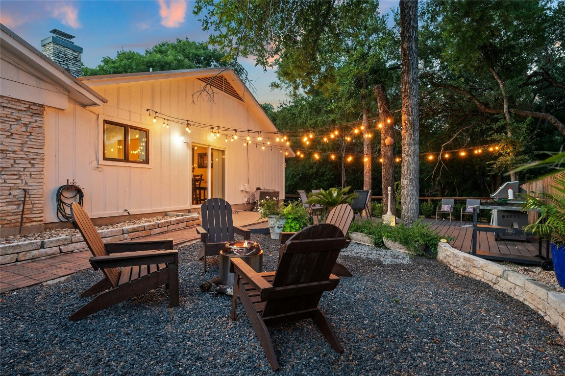 1503 Terrapin Court, Unit B Austin, TX 78746 - Photo 23 of 28 a backyard of a house with outdoor seating