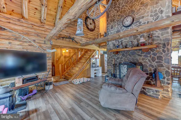 a view of a dining table and chairs in a room