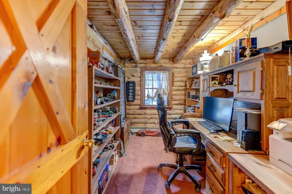 a bathroom with a sink vanity and a mirror