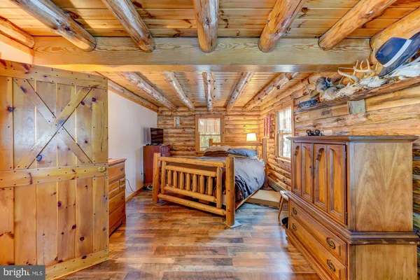a view of a patio with a table and chairs