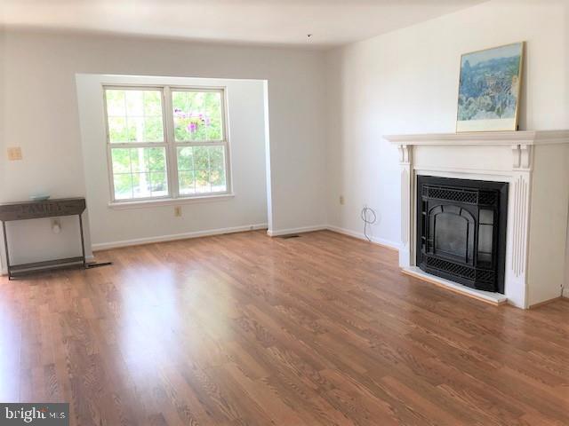 25700 Woodfield Road Damascus, MD 20872 - Photo 14 of 22 Living Room with Fireplace