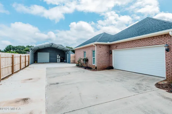 a view of a house with a patio