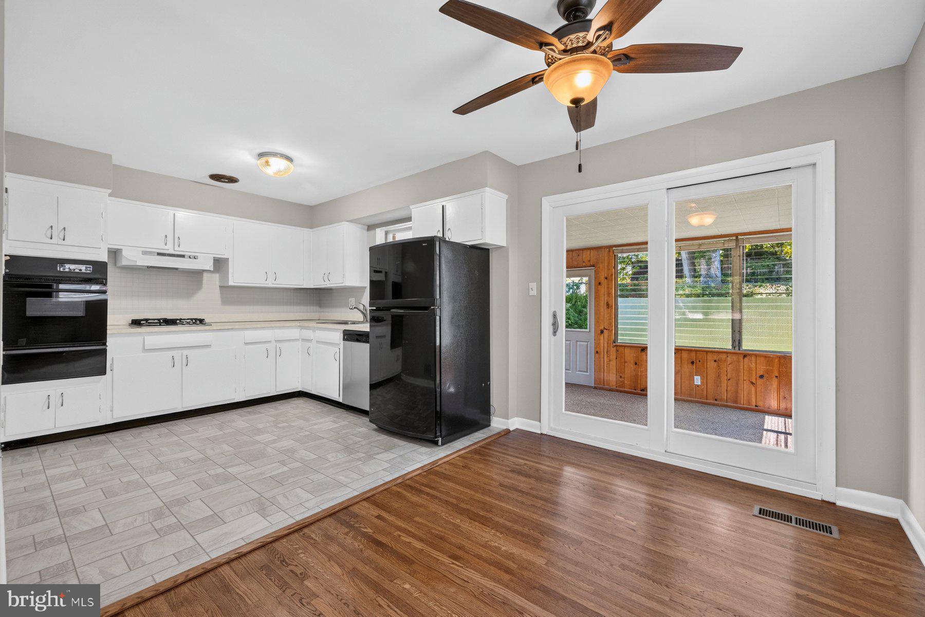 4035 Adams Drive Silver Spring, MD 20902 - Photo 8 of 37 Dining Rm, Kitchen & Sun Room