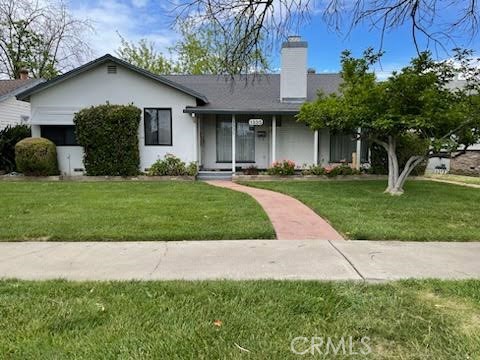 1335 West 19th Street Merced, CA 95340 - Photo 1 of 1 a view of a yard in front of a house
