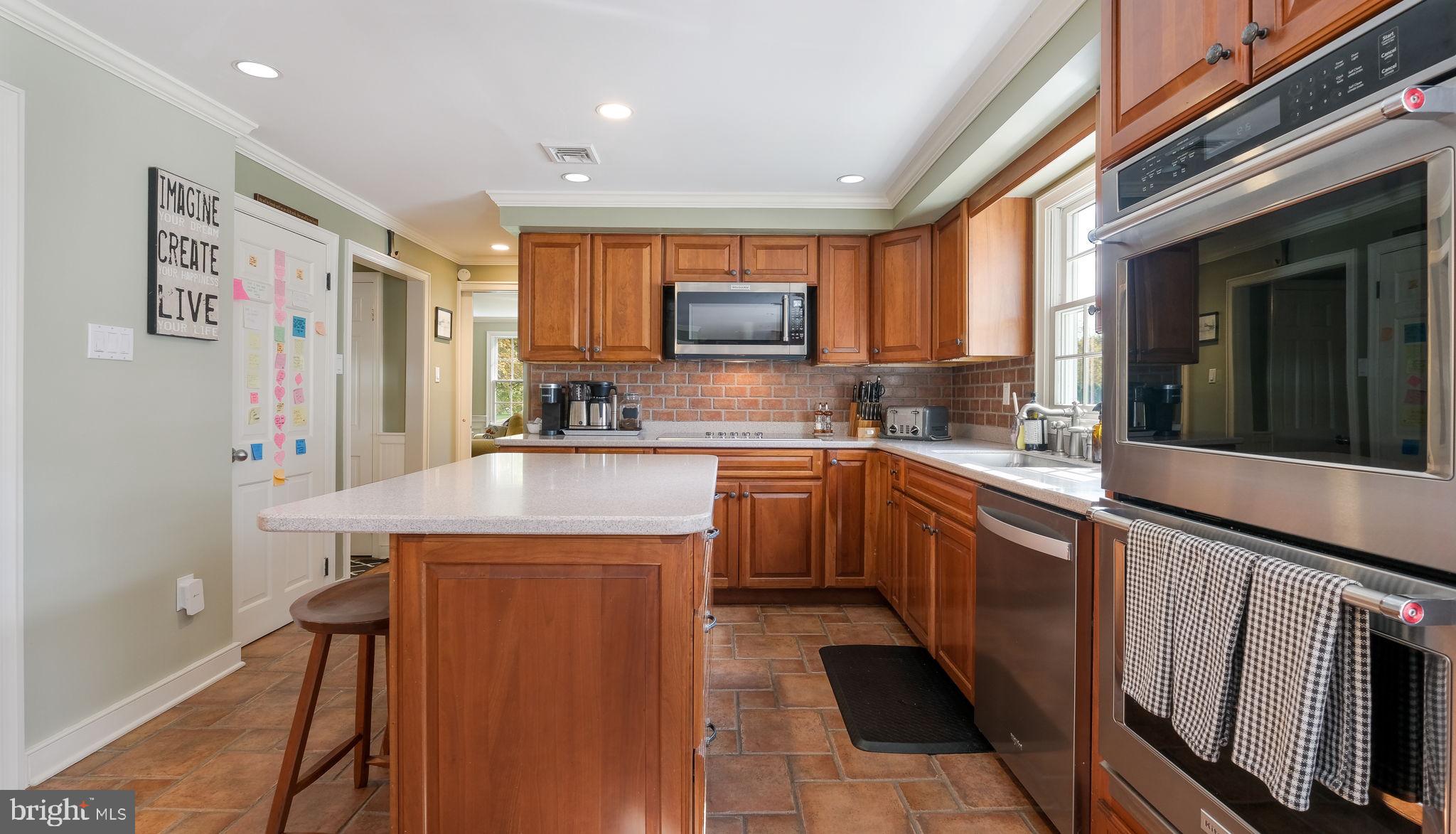 3890 Robin Road Furlong, PA 18925 - Photo 29 of 65 Upgraded Kitchen w/ Corian Counters and Island
