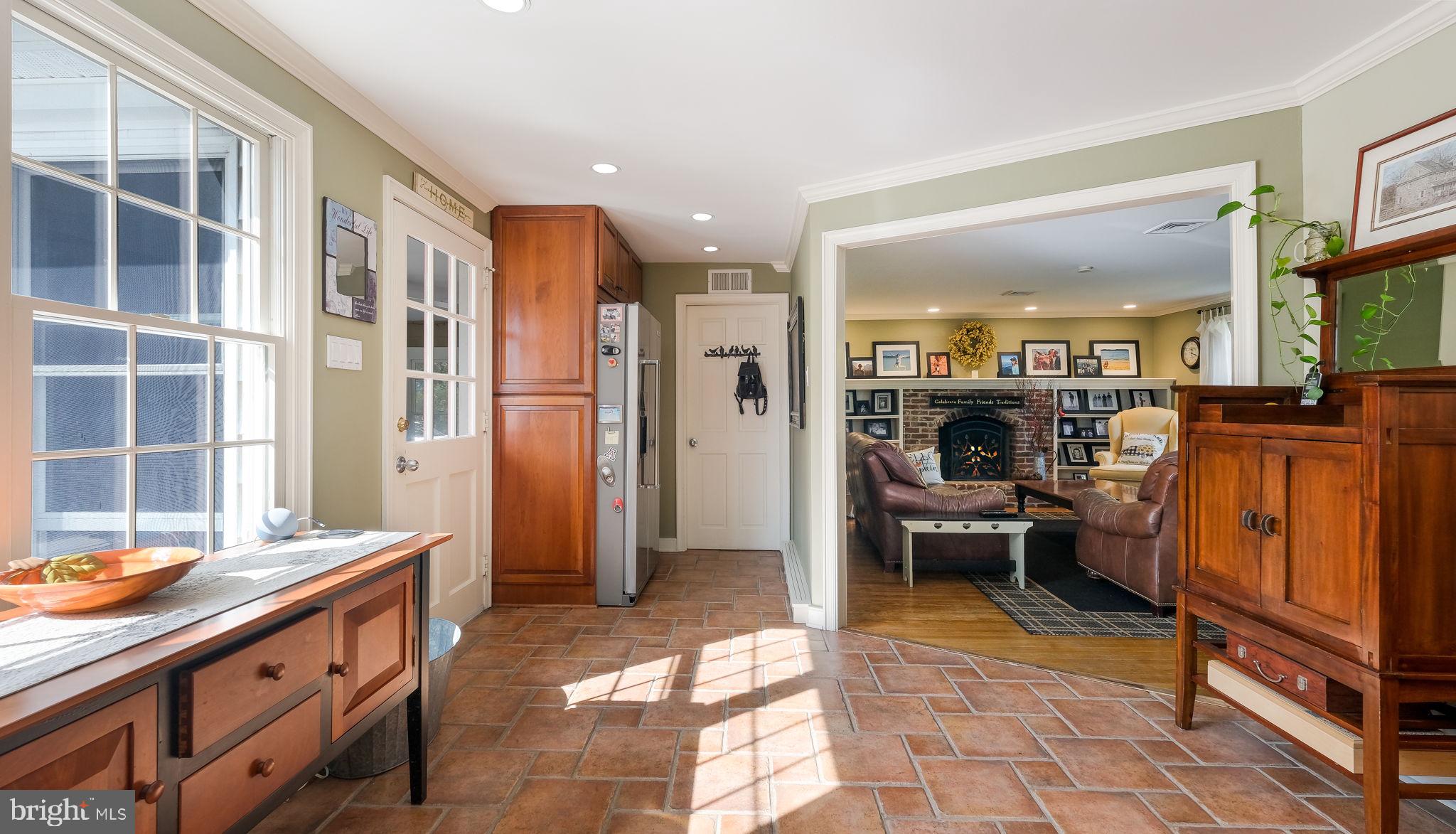 3890 Robin Road Furlong, PA 18925 - Photo 31 of 65 Kitchen w/ View of Fireplace in Family Room
