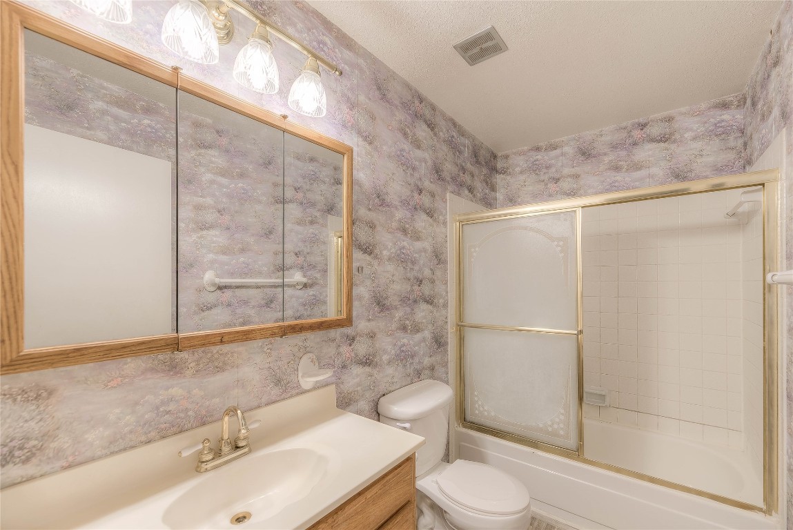25634 Chestnut Lane Splendora, TX 77372 - Photo 21 of 45 a bathroom with a sink toilet and shower