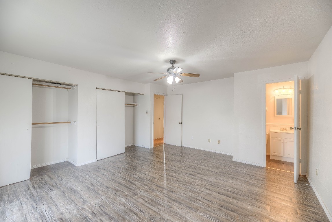 25634 Chestnut Lane Splendora, TX 77372 - Photo 23 of 45 a view of an empty room with wooden floor
