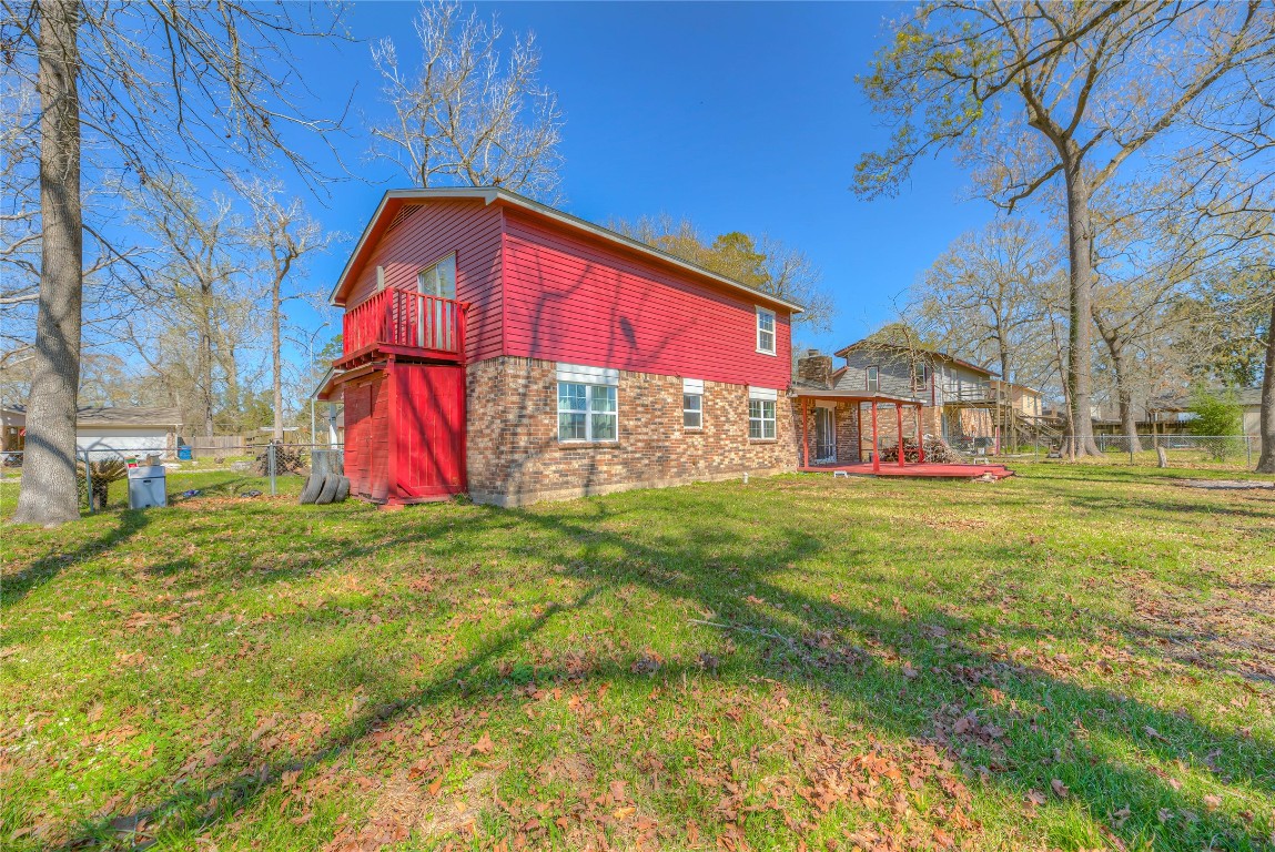 25634 Chestnut Lane Splendora, TX 77372 - Photo 32 of 45 a view of outdoor space with garden and entertaining space