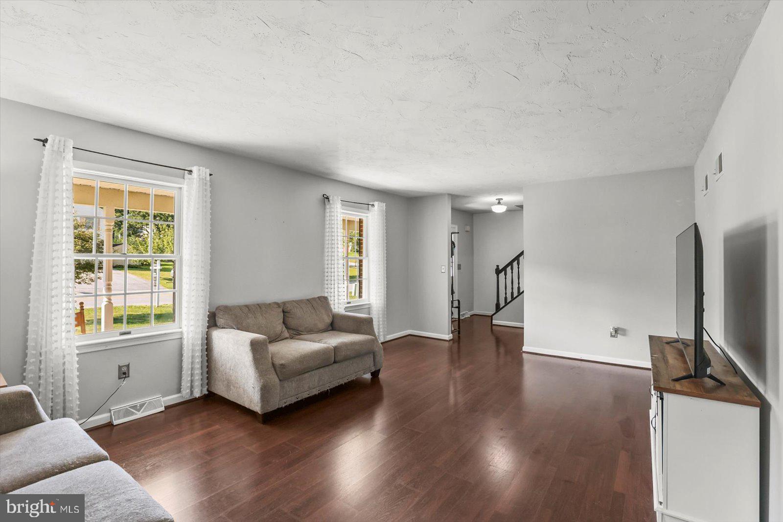 113 Timber Lane Hanover, PA 17331 - Photo 11 of 43 a living room with furniture window and wooden floor