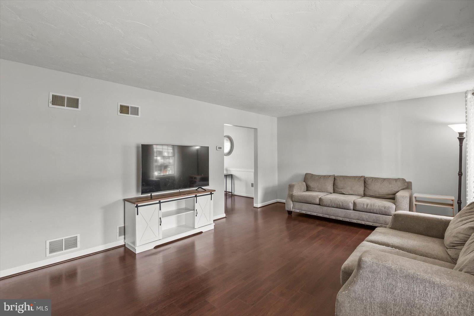 113 Timber Lane Hanover, PA 17331 - Photo 12 of 43 a living room with furniture and a flat screen tv