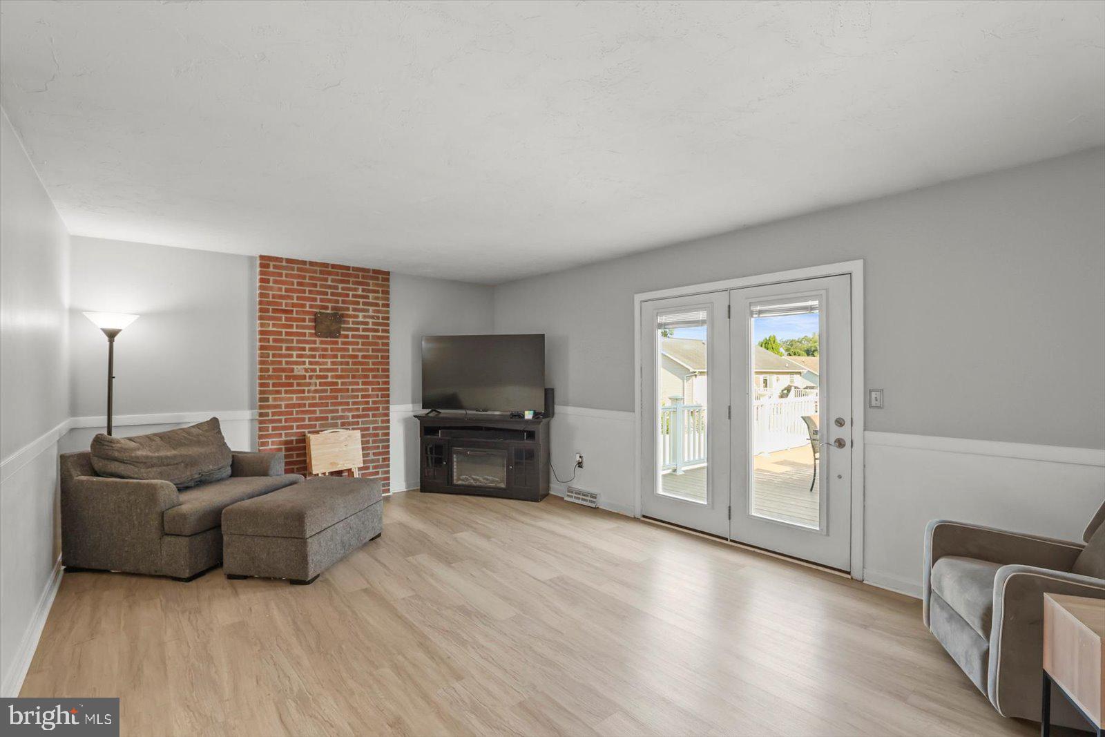 113 Timber Lane Hanover, PA 17331 - Photo 15 of 43 a living room with furniture and a flat screen tv