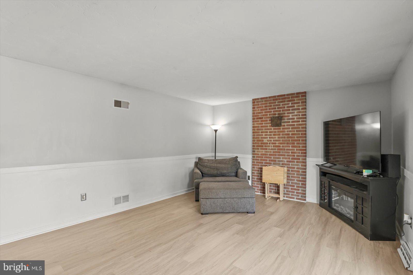 113 Timber Lane Hanover, PA 17331 - Photo 16 of 43 a living room with furniture and a flat screen tv