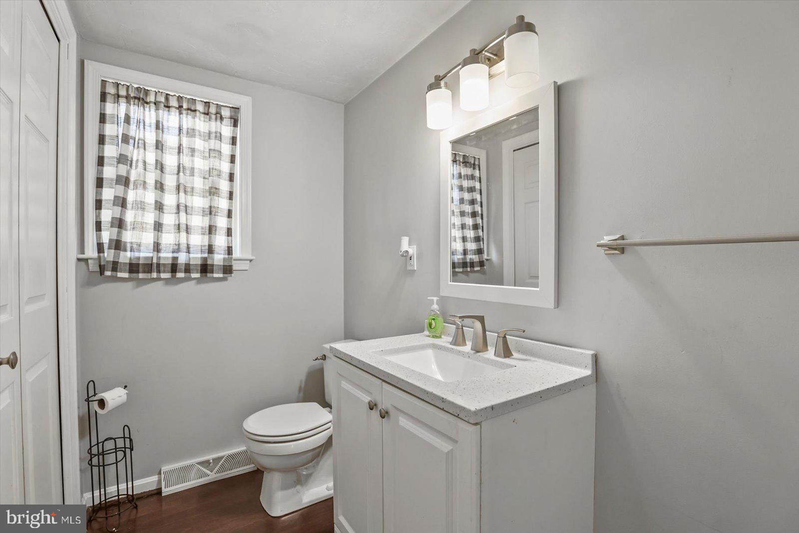 113 Timber Lane Hanover, PA 17331 - Photo 19 of 43 a bathroom with a toilet sink and mirror