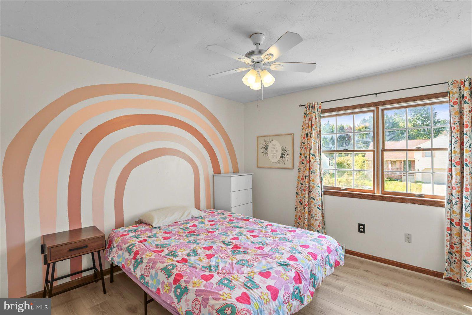 113 Timber Lane Hanover, PA 17331 - Photo 20 of 43 a bedroom with a bed and a chandelier