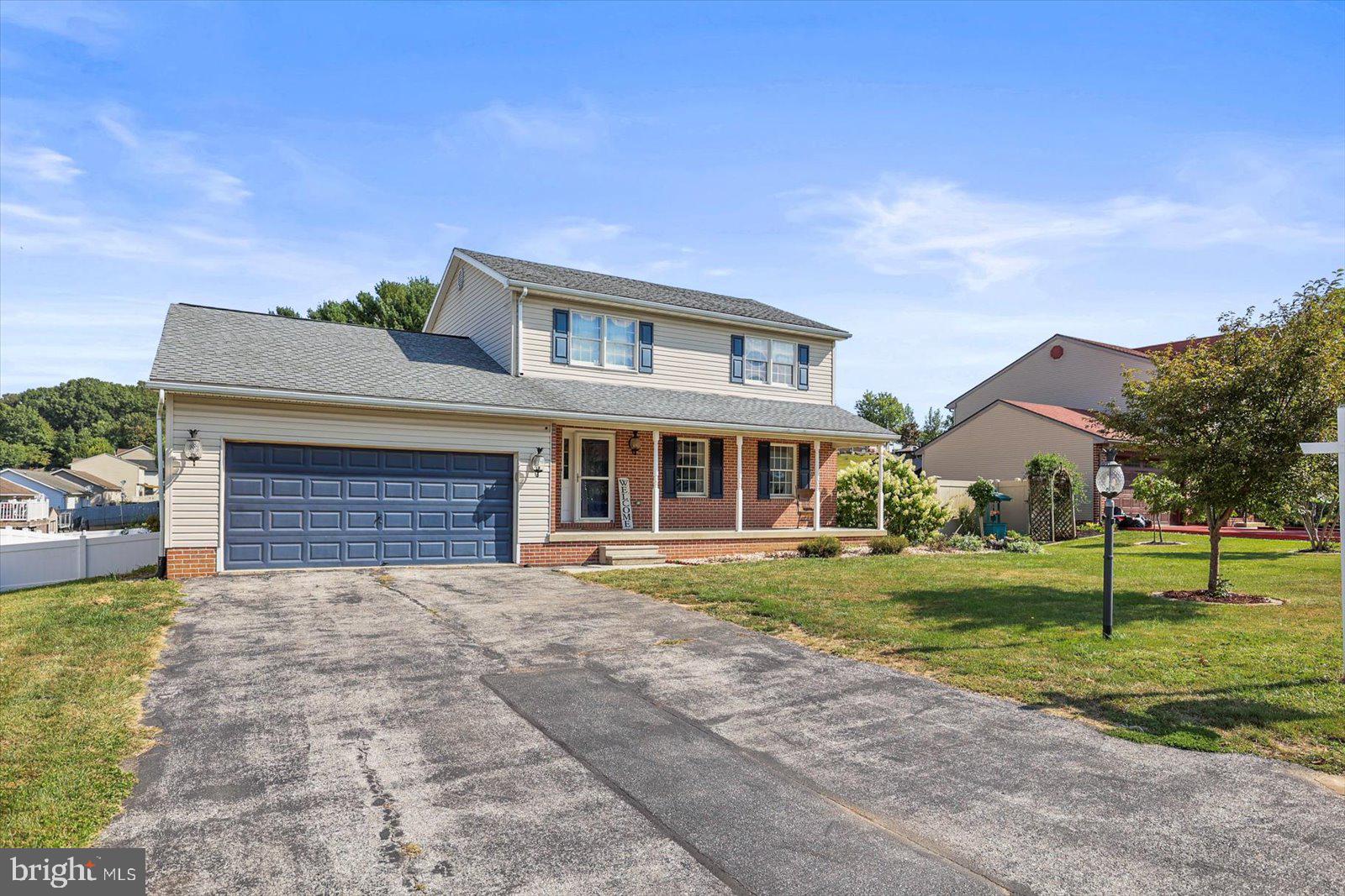 113 Timber Lane Hanover, PA 17331 - Photo 2 of 43 a front view of a house with a yard