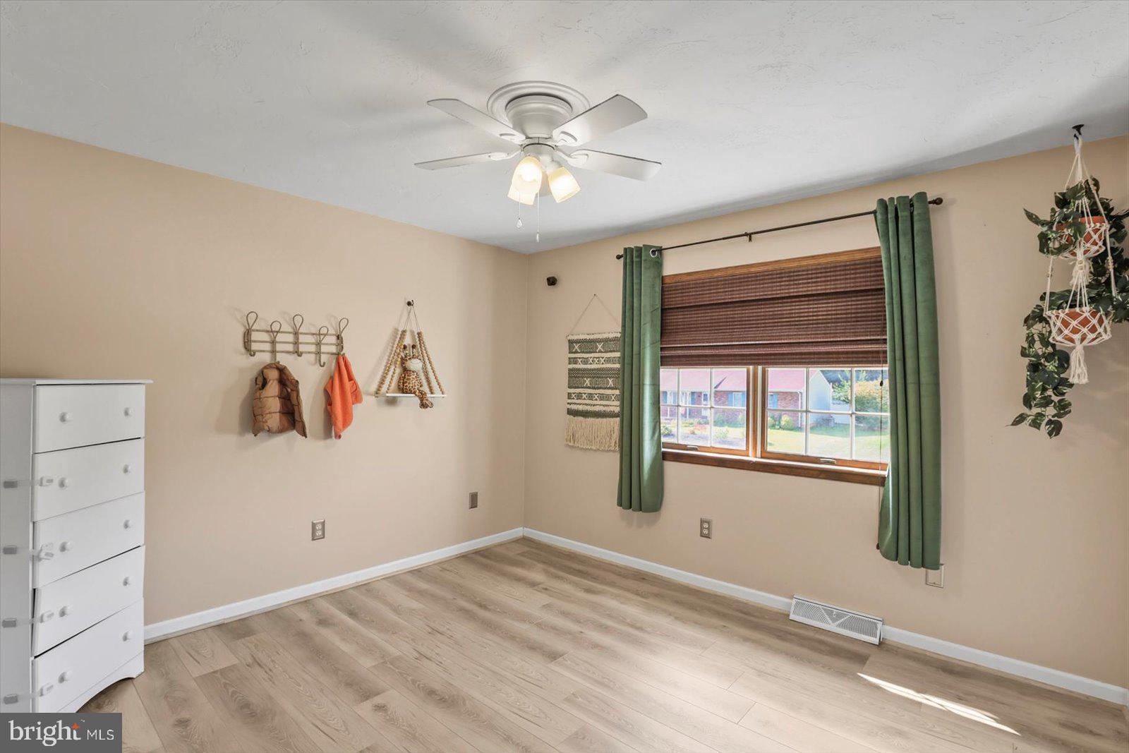 113 Timber Lane Hanover, PA 17331 - Photo 27 of 43 a view of empty room with window and ceiling fan