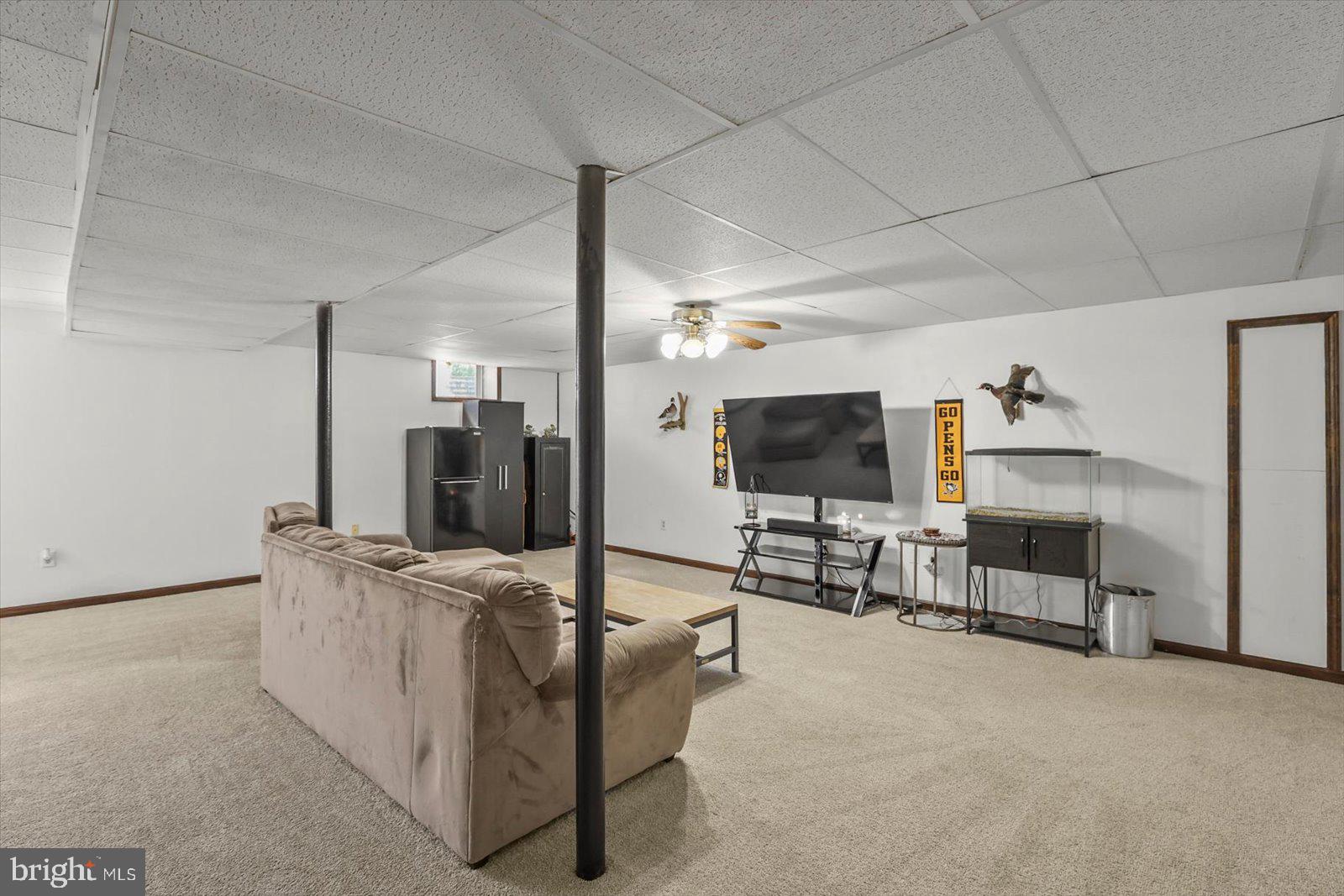 113 Timber Lane Hanover, PA 17331 - Photo 31 of 43 a living room with furniture and a flat screen tv