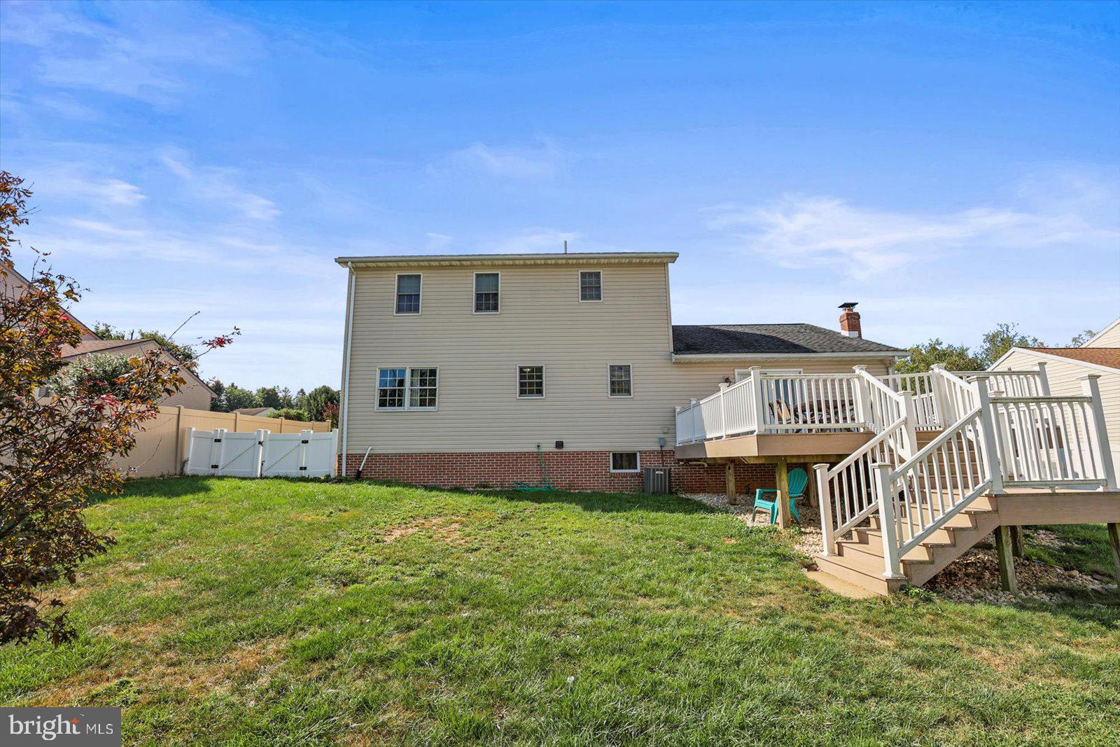 113 Timber Lane Hanover, PA 17331 - Photo 35 of 43 a view of a house with a yard and deck