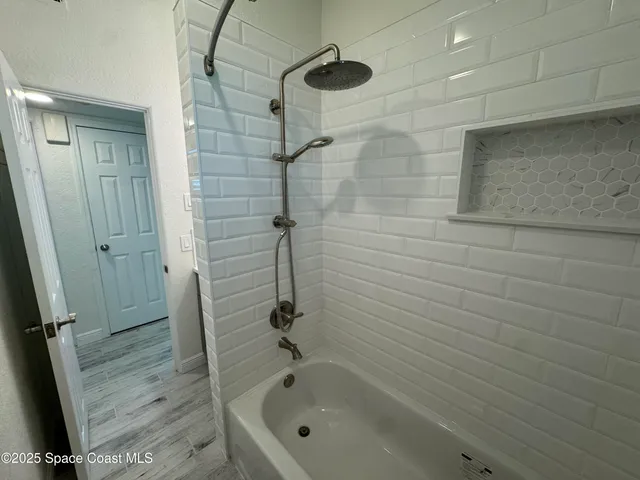 a bathroom with a bathtub