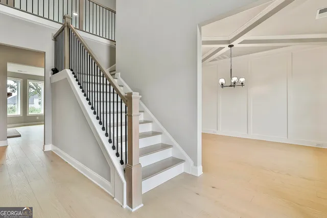 a view of a hallway with staircase