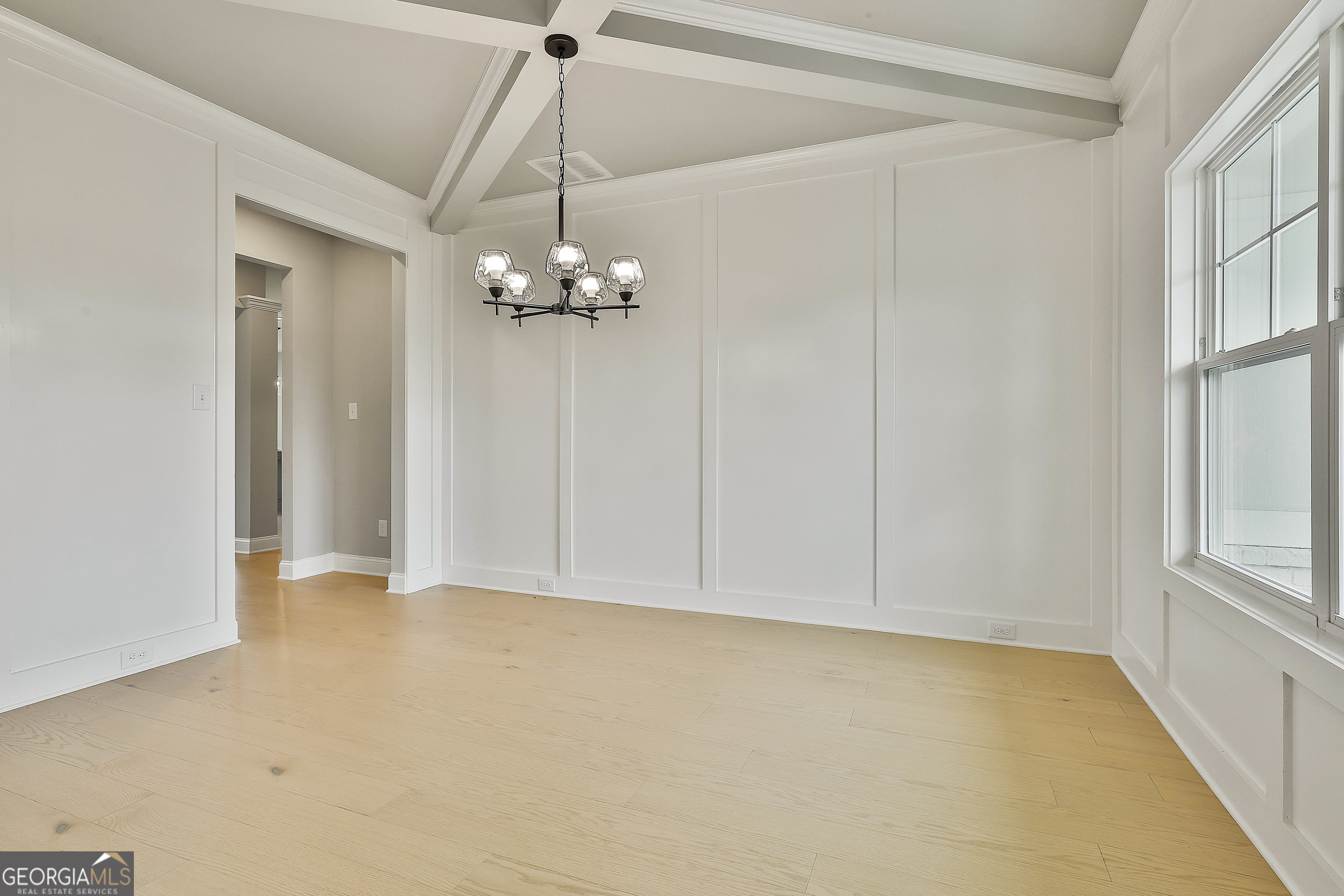291 Grove Park, Unit 90 Senoia, GA 30276 - Photo 12 of 53 a view of an empty room with a window