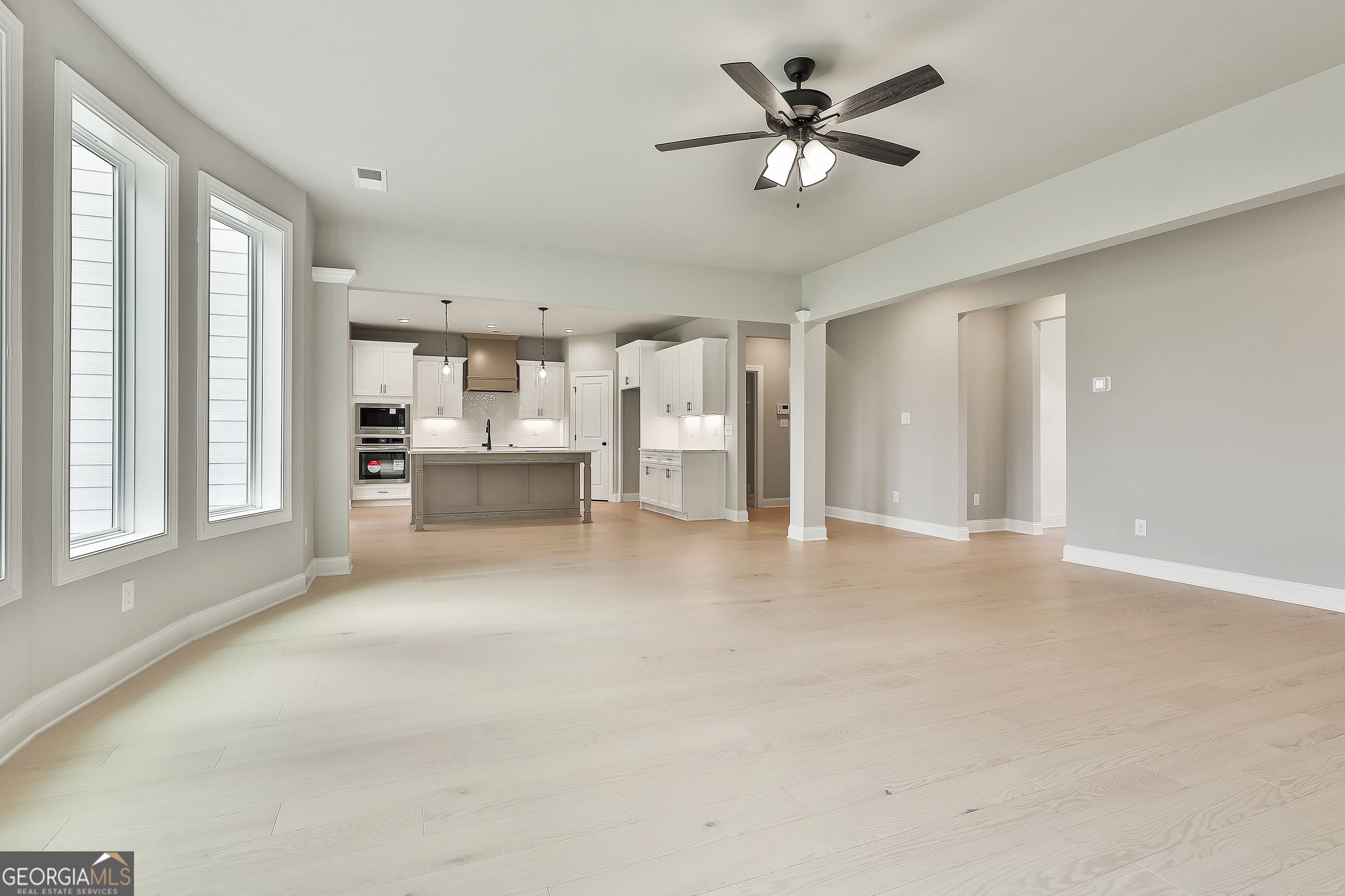 291 Grove Park, Unit 90 Senoia, GA 30276 - Photo 17 of 53 a view of an empty room with a window