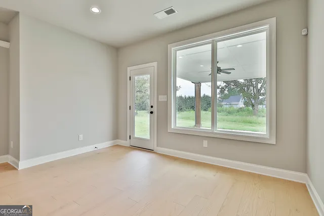 an empty room with windows