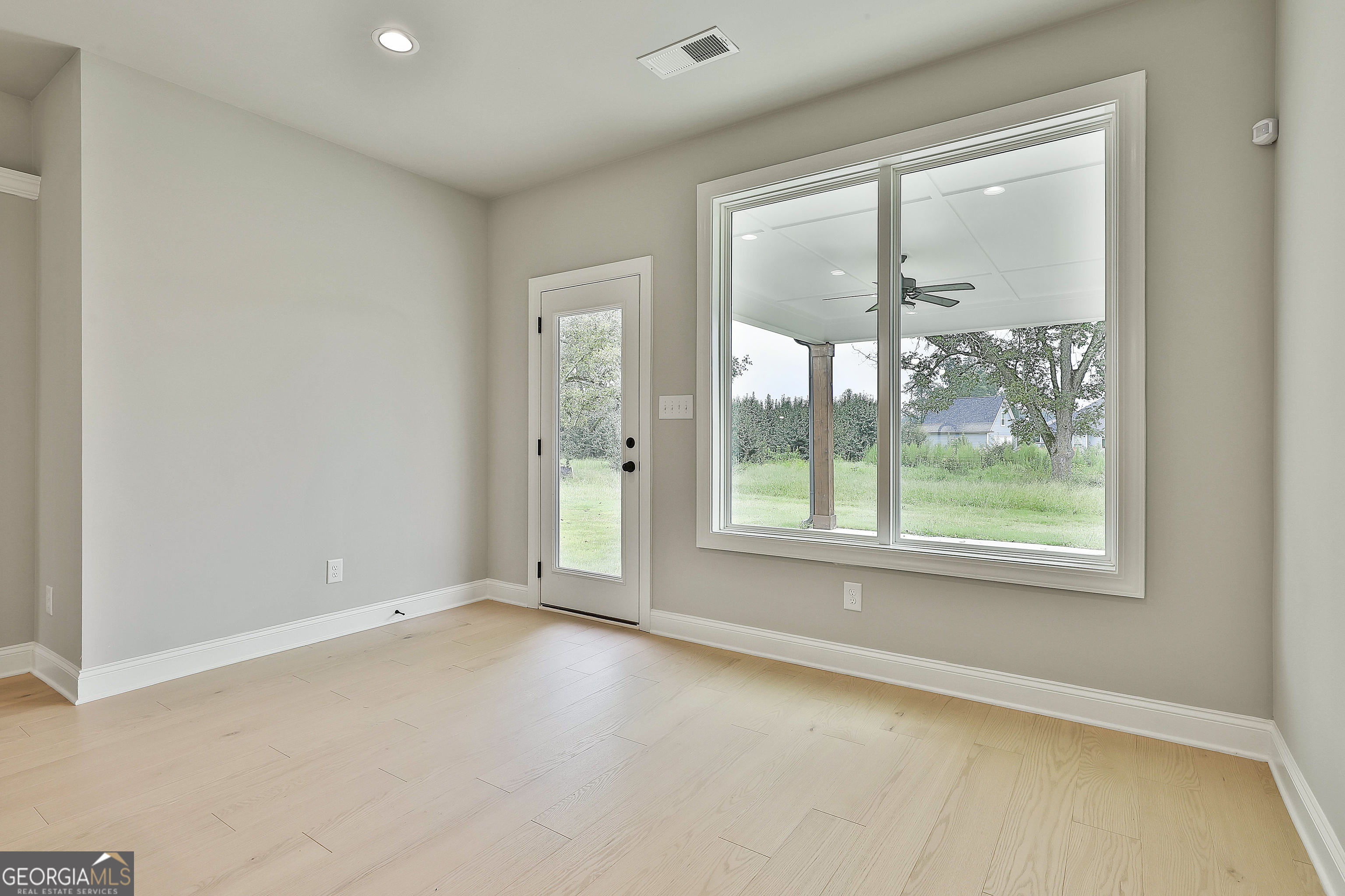 291 Grove Park, Unit 90 Senoia, GA 30276 - Photo 23 of 53 an empty room with windows
