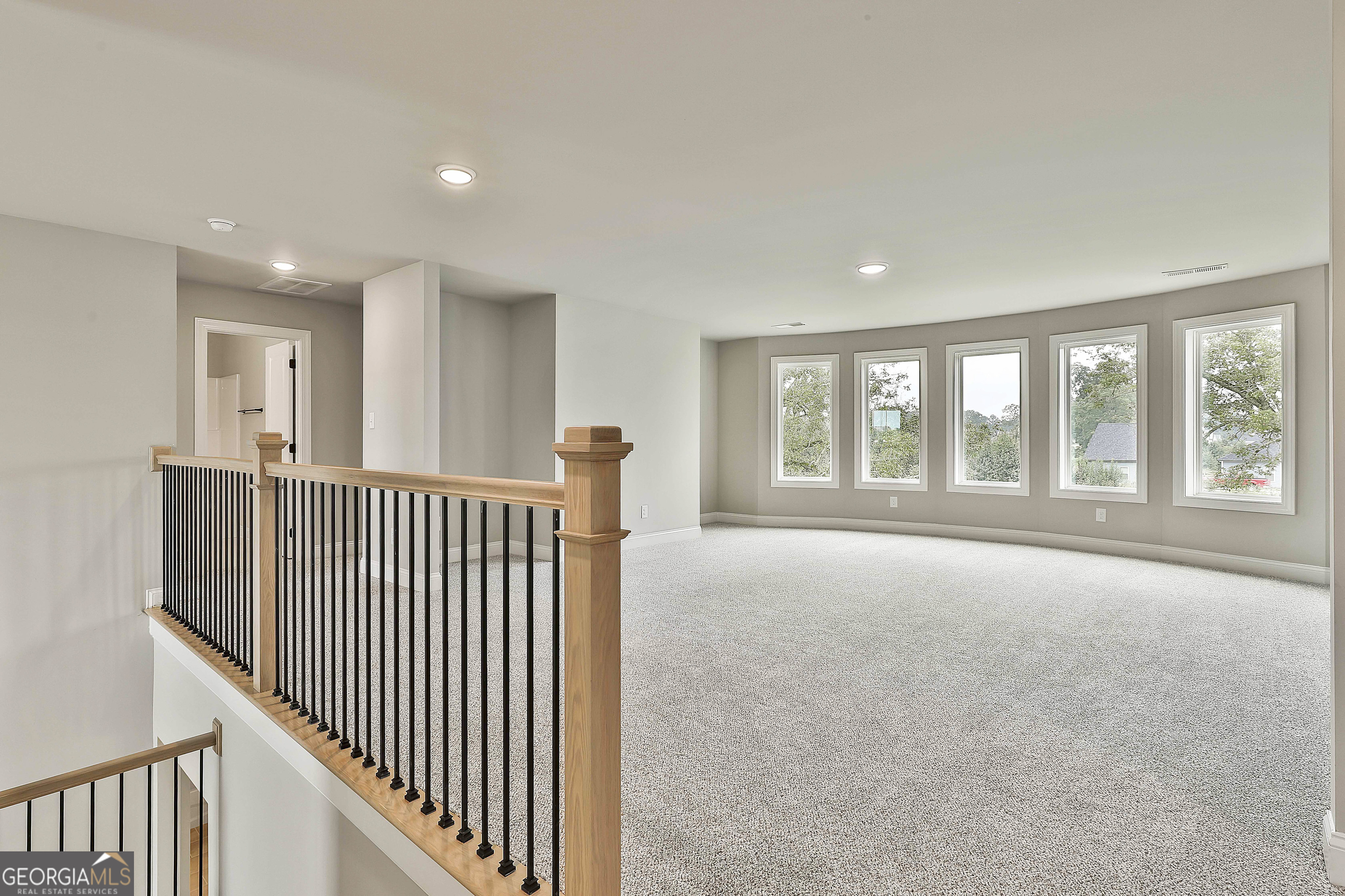 291 Grove Park, Unit 90 Senoia, GA 30276 - Photo 31 of 53 a view of an empty room with a window