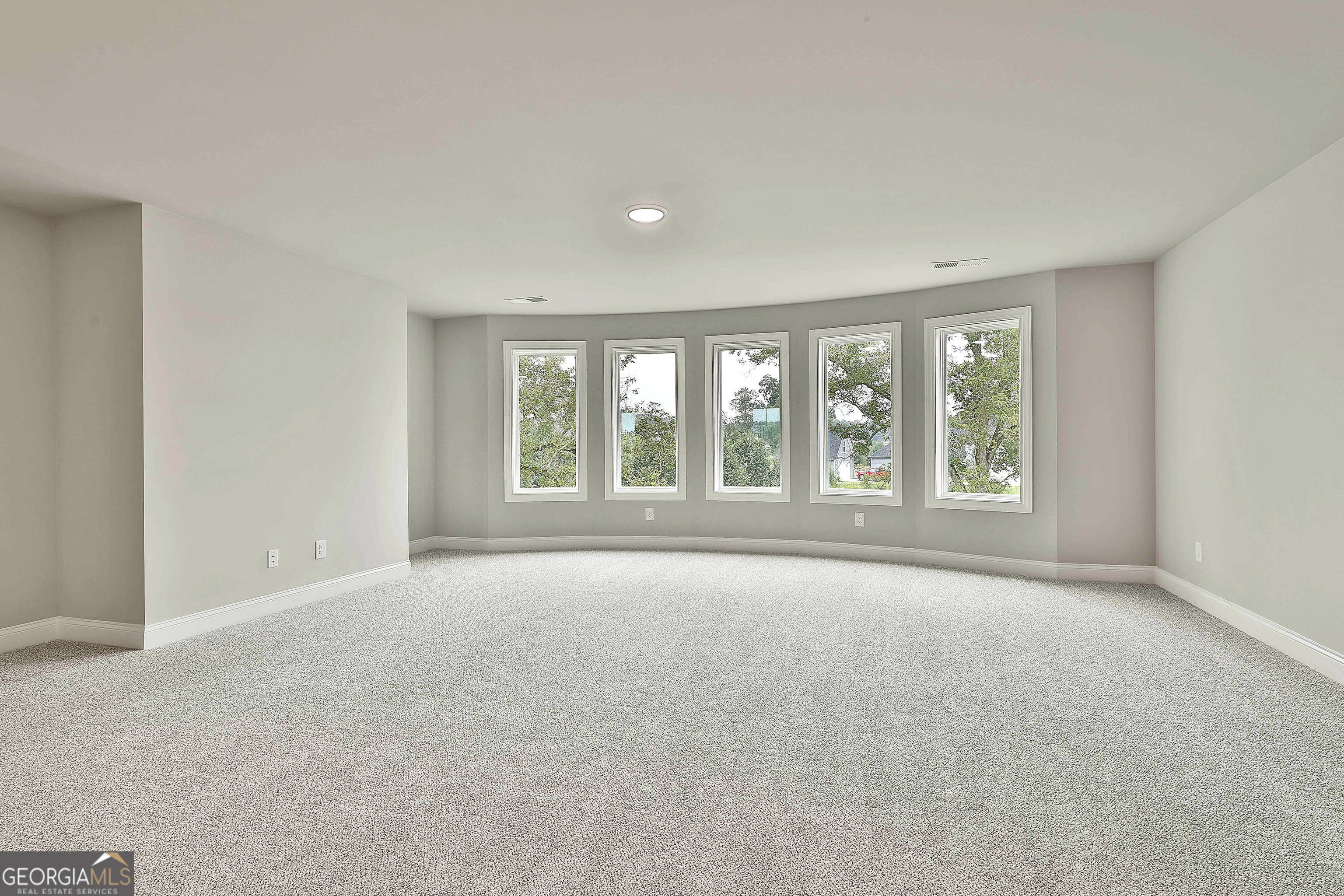 291 Grove Park, Unit 90 Senoia, GA 30276 - Photo 32 of 53 a view of an empty room with a window