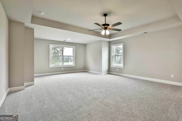 an empty room with windows