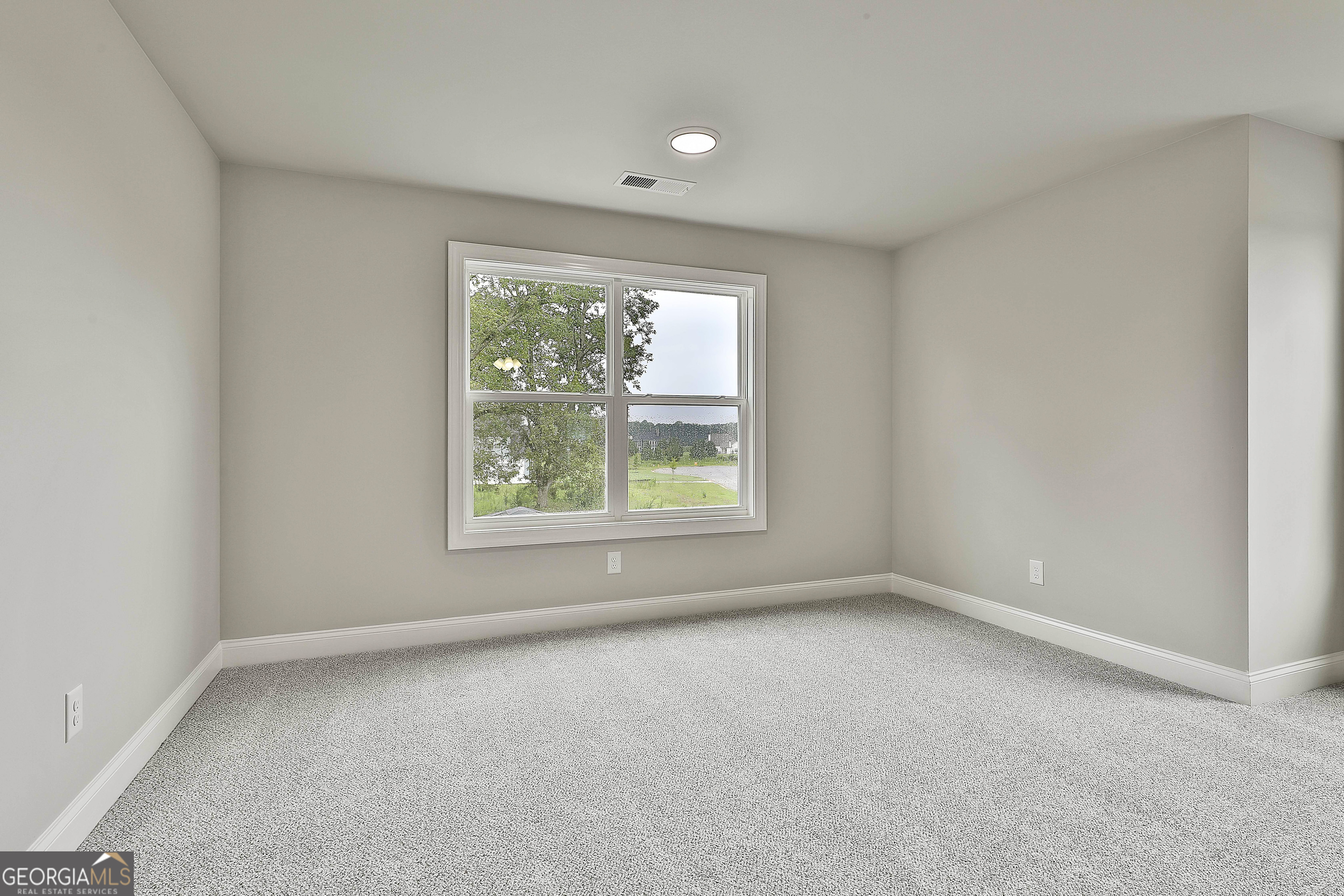 291 Grove Park, Unit 90 Senoia, GA 30276 - Photo 36 of 53 an empty room with windows